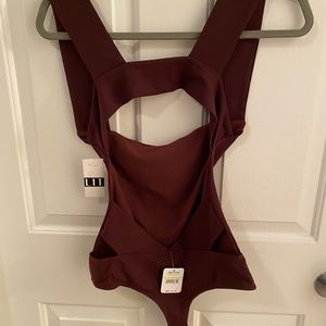 Free people size medium chocolate color body suit